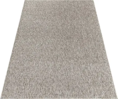 A rectangular rug with a textured, speckled gray and white pattern is shown from a slightly elevated diagonal angle against a white background.