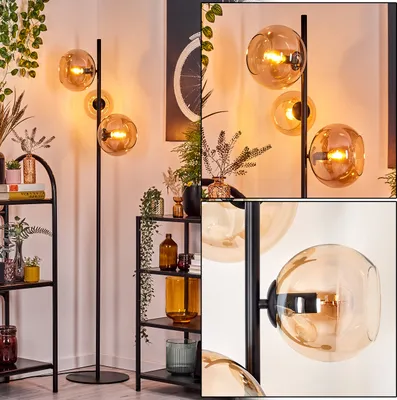 Produktbild von Carentino Stehlampe aus Metall/Glas in Schwarz/Bernsteinfarben mit Fußschalter