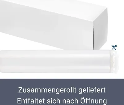 A white box and a rolled-up white product, possibly fabric or plastic sheeting, with scissors indicating it can be cut.
