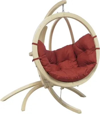 A wooden hanging chair with a red cushion, shown on a white background.