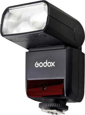 A studio shot of a camera flash unit.