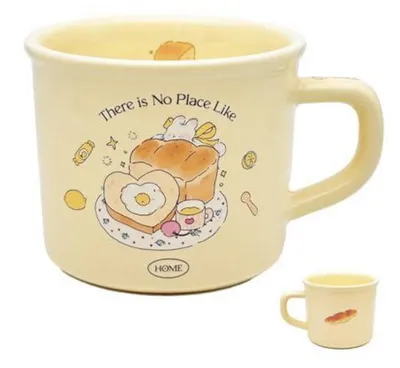 Immagine prodotto di Tazza da caffè in Vetroceramica, decorata con un motivo a coniglietti e toast, color crema, capacità 380 ml