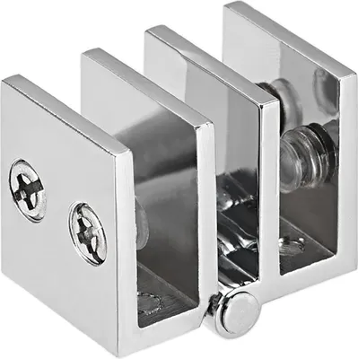 A close-up studio shot of a metal glass hinge.