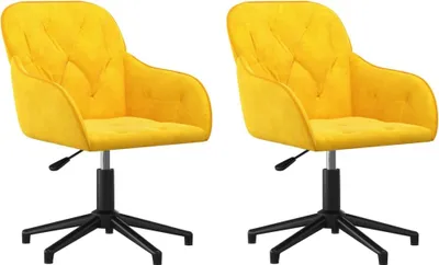 Two yellow velvet swivel chairs are shown against a white background.