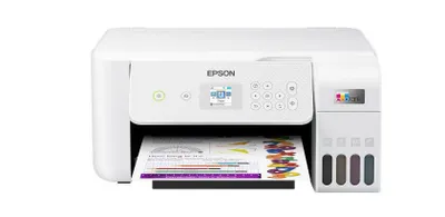 A white Epson printer is shown against a white background. A sheet of paper with colorful graphics is partially visible in the paper output tray.