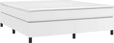 A white bed frame with a mattress on top, shown from a side angle.