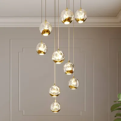 Produktbild von Lucande LED-Hängelampe Hayley, Ø 40 cm, 9-flg., gold, Glas