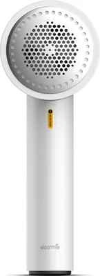 A white electric lint remover and fabric shaver with a gray mesh head and a yellow indicator light.