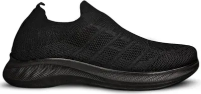 A black slip-on sneaker shown from the side against a white background.