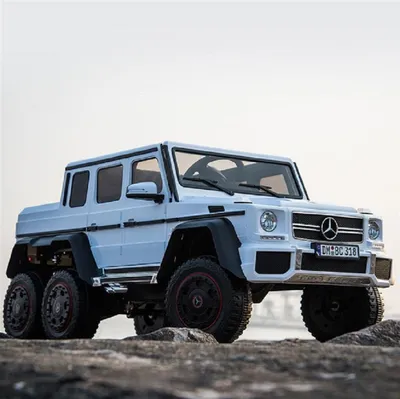 Obrázek produktu pro Dětské elektrické auto "Mercedes G63 AMG 6x6" - licencované - baterie 12V7AH + 2,4GHz + kožené sedadlo + EVA - bílá barva