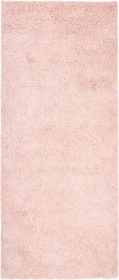 A close-up, full-frame shot of a pink rug.