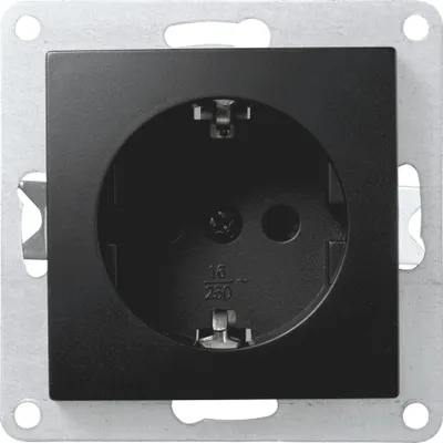 A close-up, front-facing view of a black electrical outlet mounted on a metallic frame.