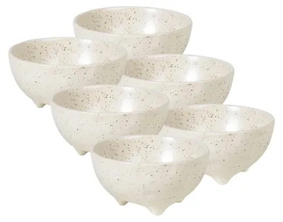 A set of six cream-colored ceramic bowls with speckled detailing and three small feet.