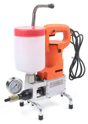 Produktbild von Hochdruck-Verpressgerät - Chemische Injektionspumpe - 10000 psi - 720 W - Elektrisch - Zur Reparatur von Betonrissen