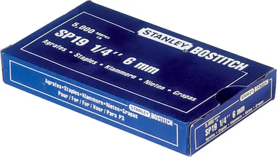 A close-up, angled view of a blue cardboard box containing staples.