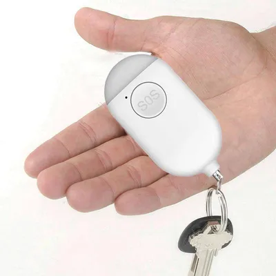 Obrázek produktu pro CHPN – Alarm – Osobní alarm – Klíčenka s alarmem – 130 dB – Nouzové signalizační zařízení – LED světlo – Vodotěsné (IP44) – Klíčenka – Bílá barva – Dobíjecí