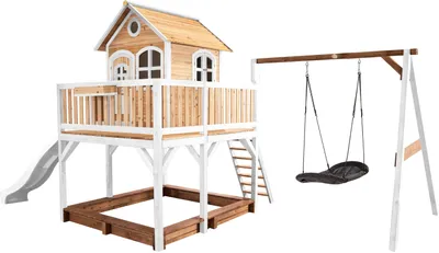 Produktbild von AXI Spielhaus Liam mit Sandkasten, Nestschaukel & weißer Rutsche | Stelzenhaus XXL in Braun & Weiß aus  Holz für Kinder | Spielturm mit Wellenrutsche & Schaukel für den Garten