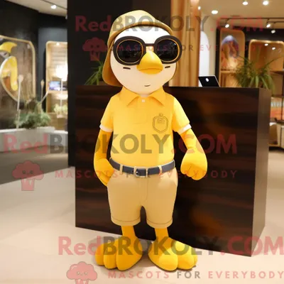 Produktbild von Maskottchenkostüm REDBROKOLY Goldener Pinguin mit Poloshirt und Brille