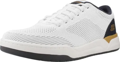 A single white sneaker with navy and gold accents.