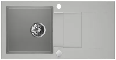 A top-down view of a gray granite kitchen sink with a drainer and a single basin.