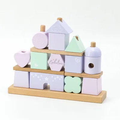 Produktbild von Stapelhaus für Kinder, pink, mit passenden Bauklötzen zum Stapeln und Konstruieren