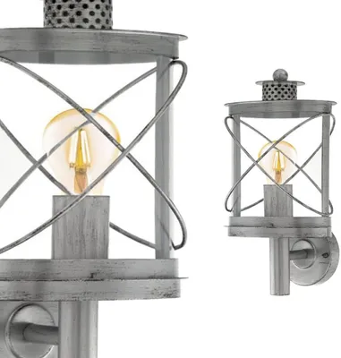 A close-up and a smaller, full view of a silver-antique outdoor wall lamp with a visible light bulb.