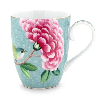 A close-up studio shot of a decorative mug.