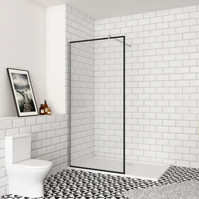 A modern bathroom with a walk-in shower, toilet, and patterned floor.