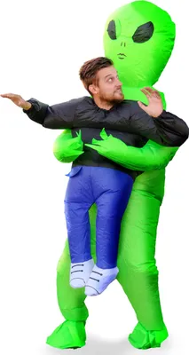 A person wearing an inflatable alien costume.