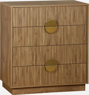 A wooden chest of drawers with a ribbed texture and gold circular handles.