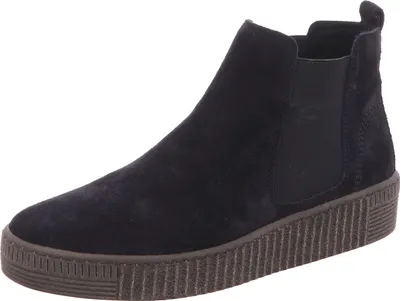 A single blue Chelsea boot is shown against a white background.