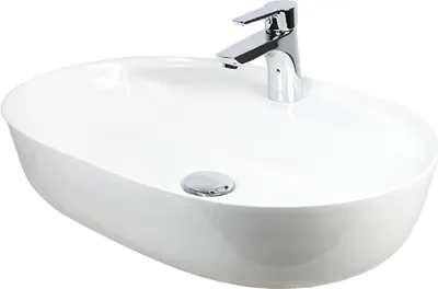 A white ceramic oval sink with a chrome faucet and drain.