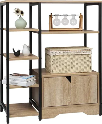 A storage shelf unit with decorative items and storage baskets.