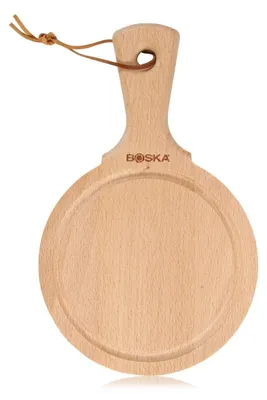 A wooden serving board with a handle and a leather strap.