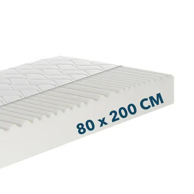 A white mattress with a quilted top layer and a textured foam base, shown at an angle against a white background. Text indicating dimensions is printed on the side.