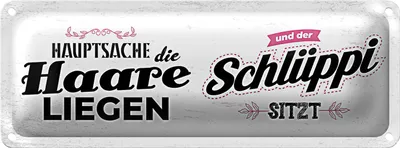 Produktbild von Blechschild Spruch Hauptsache Haare liegen Schlüppi 27x10cm