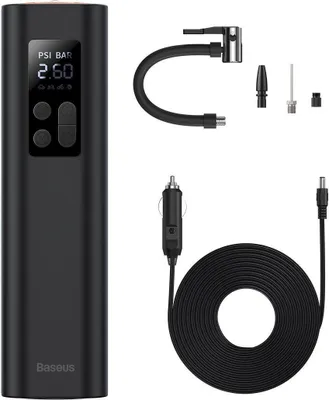 A black portable air compressor and its accessories are laid out on a white background.