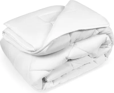 A white comforter is folded and placed on a white background.