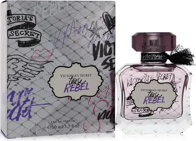 A bottle of Victoria's Secret Tease Rebel Eau de Parfum and its packaging are displayed side-by-side against a white background.