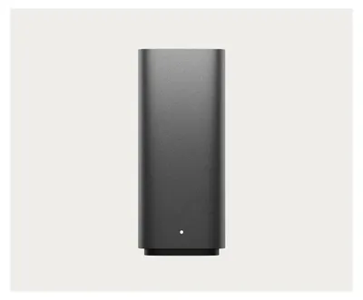 A standalone product shot of a gray NAS device against a plain background.