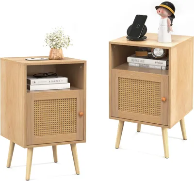 Two wooden nightstands with rattan doors and angled legs, displayed against a white background.