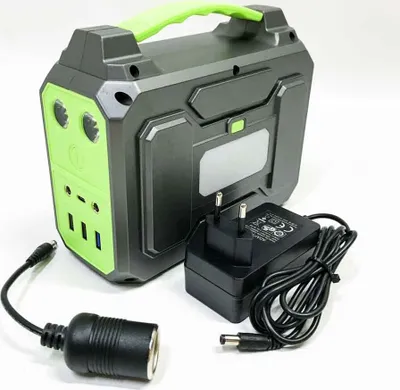 A portable power station with its accessories is displayed on a white background.