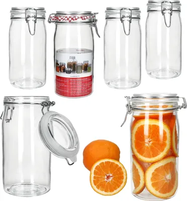 A collection of glass jars and sliced oranges.