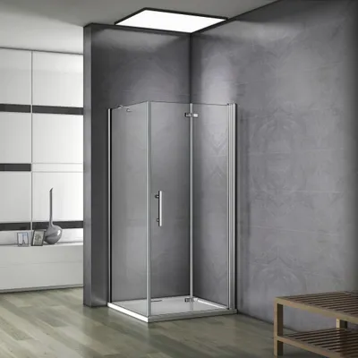 A modern bathroom with a glass shower enclosure.