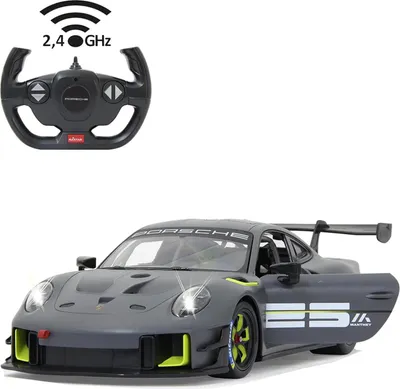 A remote-controlled Porsche 911 GT2 RS Clubsport 25 car and its steering wheel remote control.