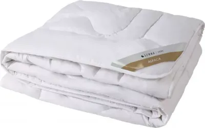 A folded white duvet is shown against a white background.