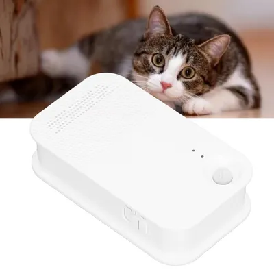 A white cat litter deodorizer is shown in the foreground with a cat in the background.