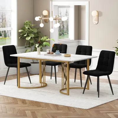 A dining set with a marble-top table and four black chairs in a well-lit room.