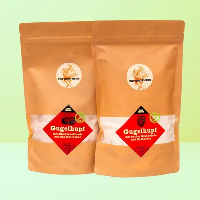 Produktbild von Zwei Glutenfreie Gugelhupfe mit Erdbeere und Kirsche mit Schokolade Backmischungen