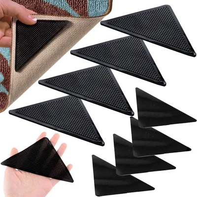 Produktbild von Retoo Teppich Antirutschunterlage, waschbar & wiederverwendbar, rutschfest, Gummi, schwarz, 4 Stück, 15 cm x 7,5 cm, für Fliesen, Vinyl, Hartholz, Marmor, Steinböden \u2013 Mehr Sicherheit für Kinder, Senioren & Haustiere